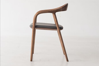 rounded wooden chair for dining table