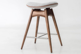 A designer bar stool fabric upholstery