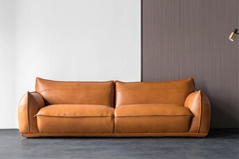 orange brown leather sofa